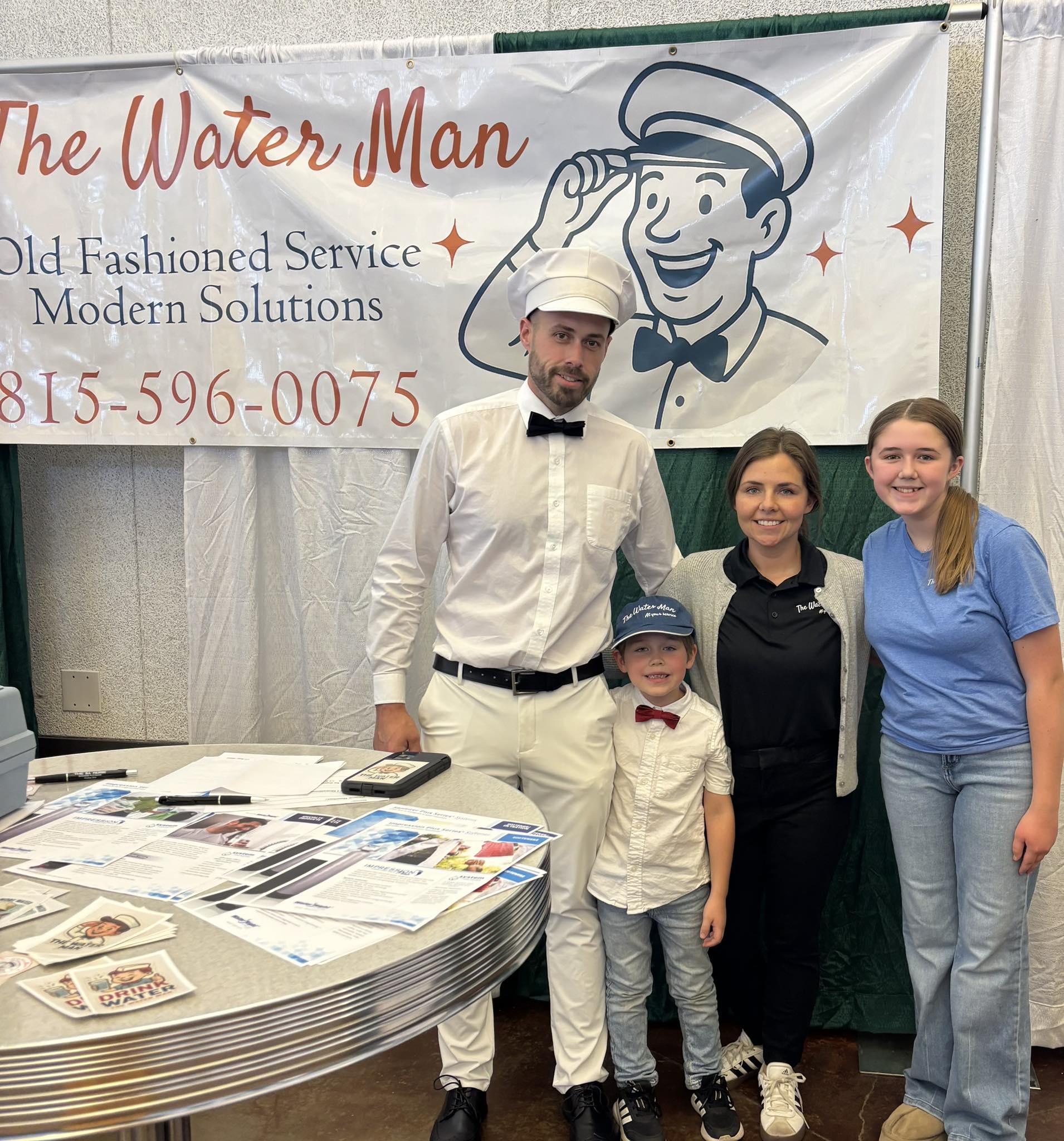 The Blackmer family representing The Water Man at a local community event