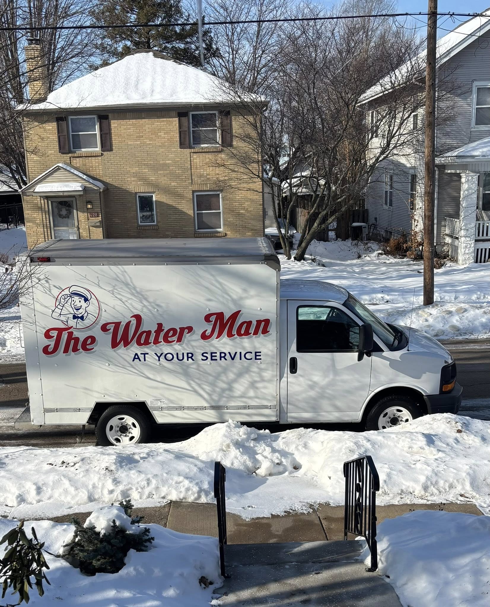 The Water Man service truck in a Northern Illinois neighborhood