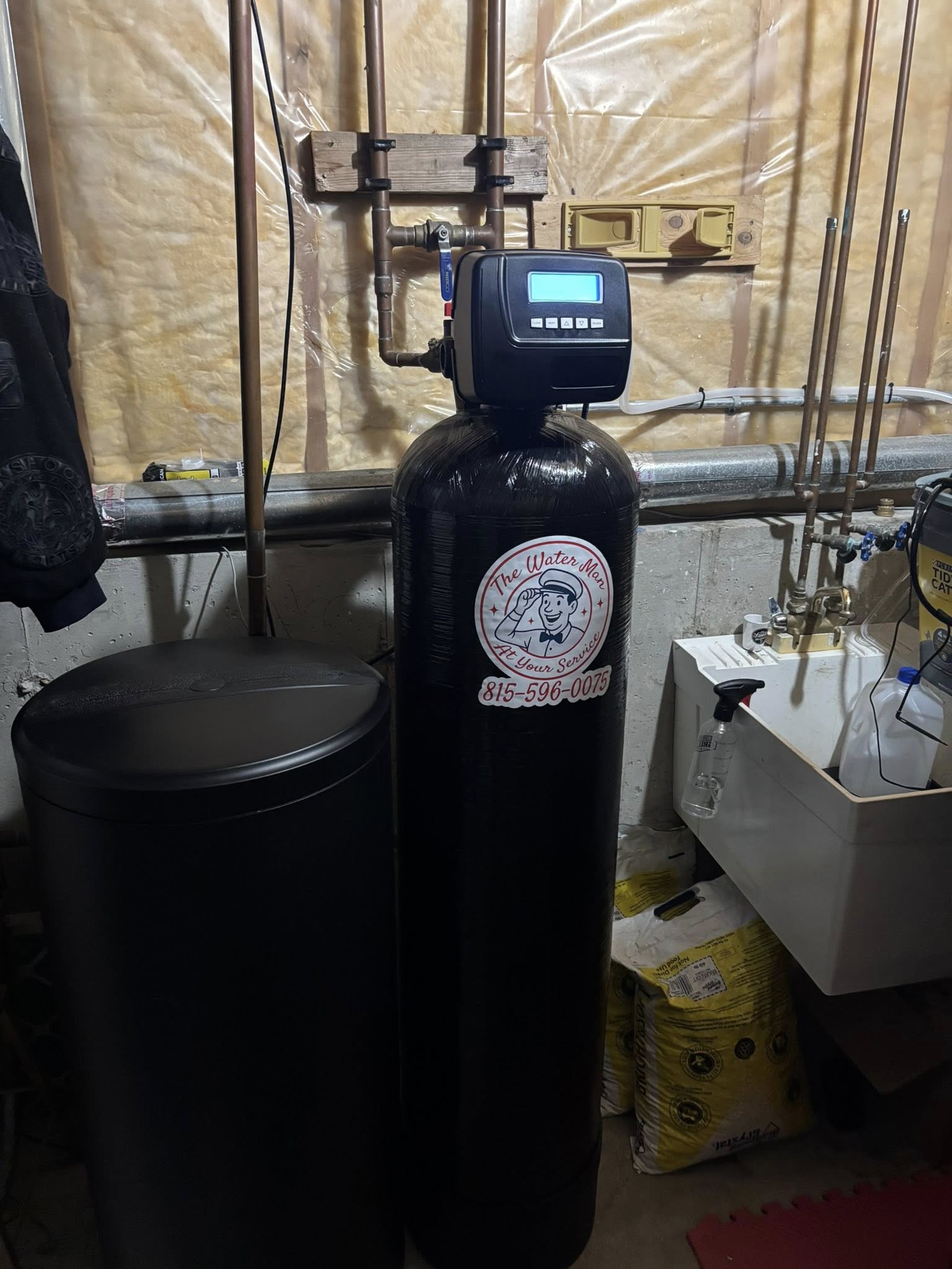 A finished Water Man whole-home filtration installation